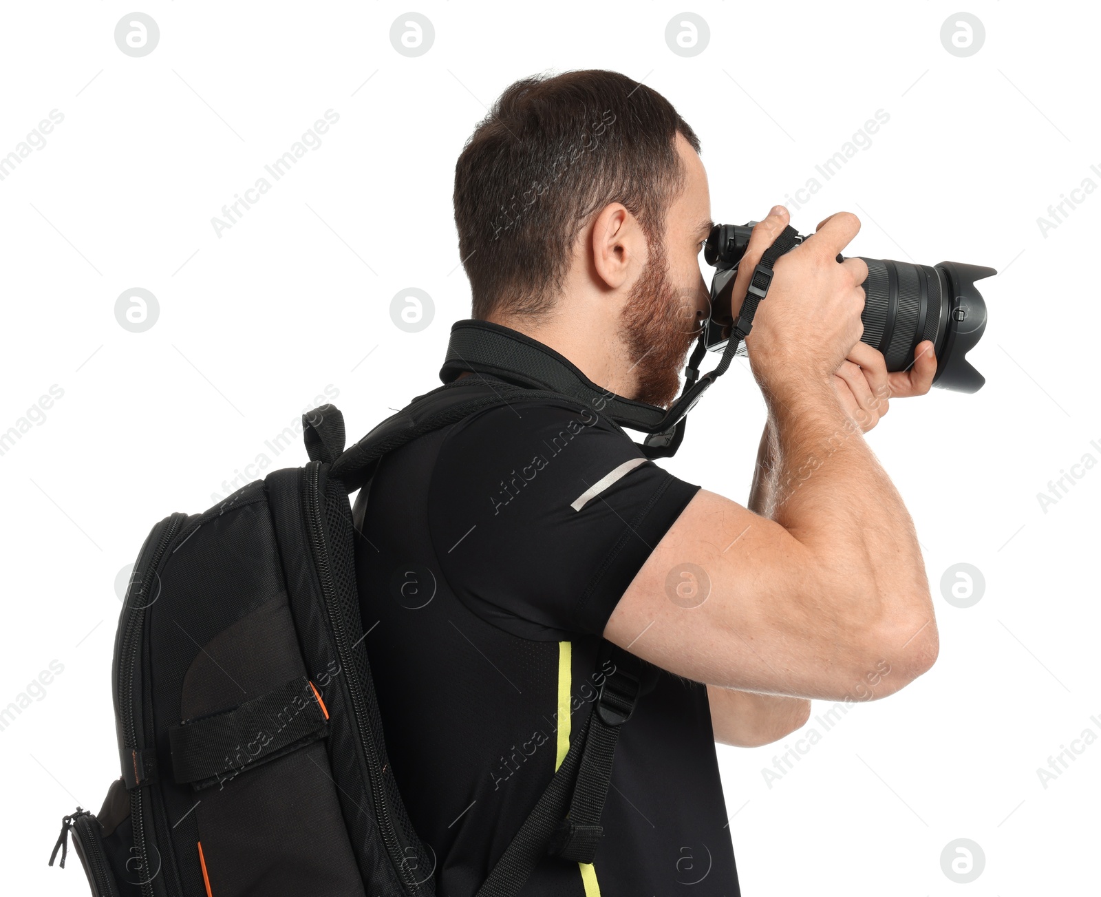 Photo of Photographer with backpack and camera taking picture on white background