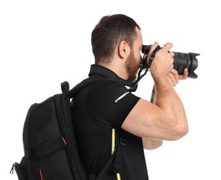 Photo of Photographer with backpack and camera taking picture on white background