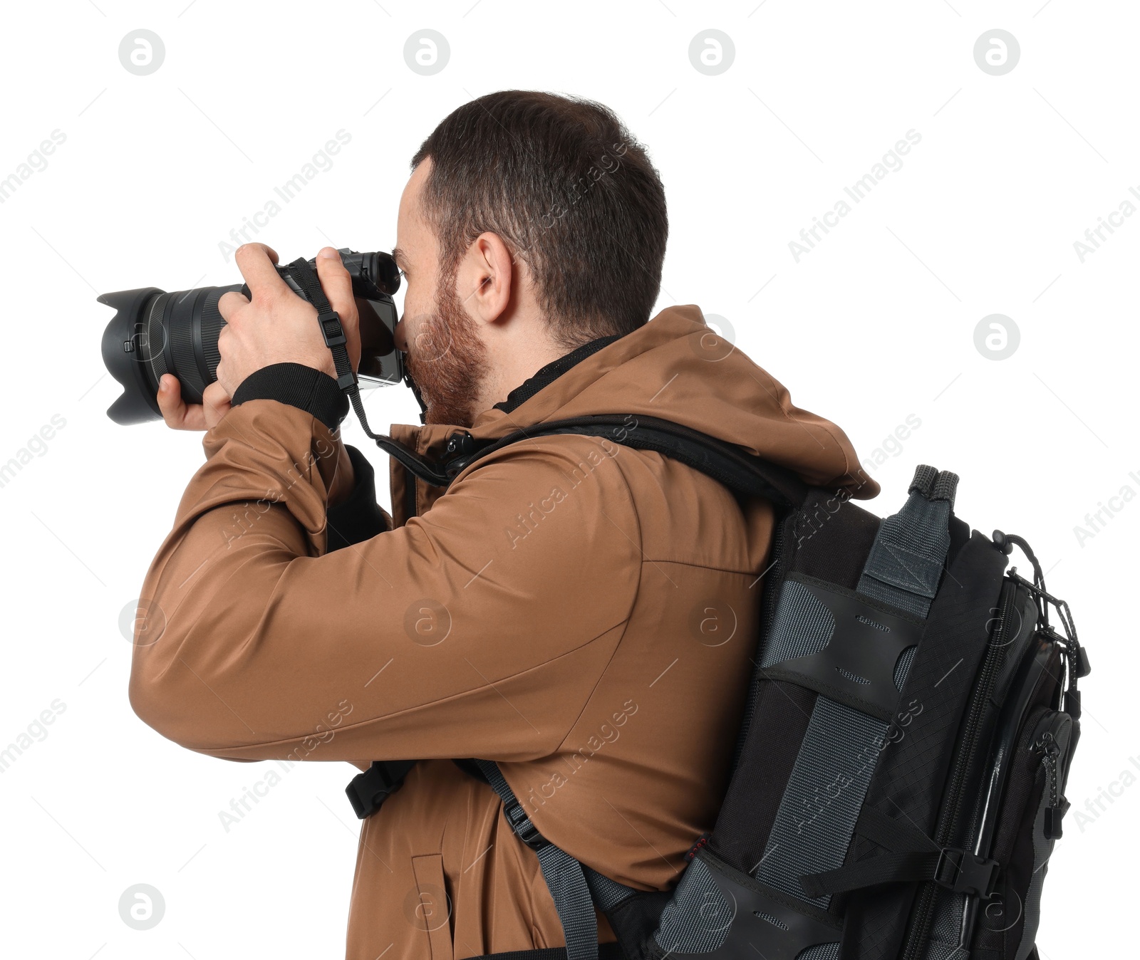 Photo of Photographer with backpack and camera taking picture on white background