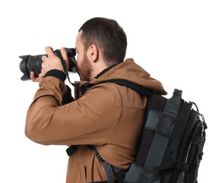 Photographer with backpack and camera taking picture on white background