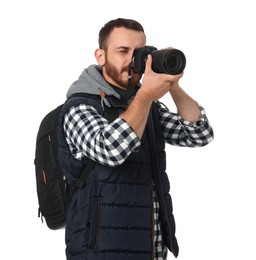 Photographer with backpack and camera taking picture on white background