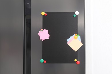 Magnetic board and notes on refrigerator in kitchen