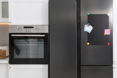 Magnetic board and notes on refrigerator in kitchen