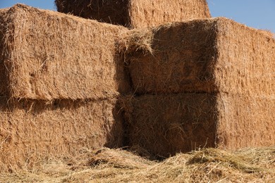 Photo of Bales of hay outdoors on sunny day, closeup