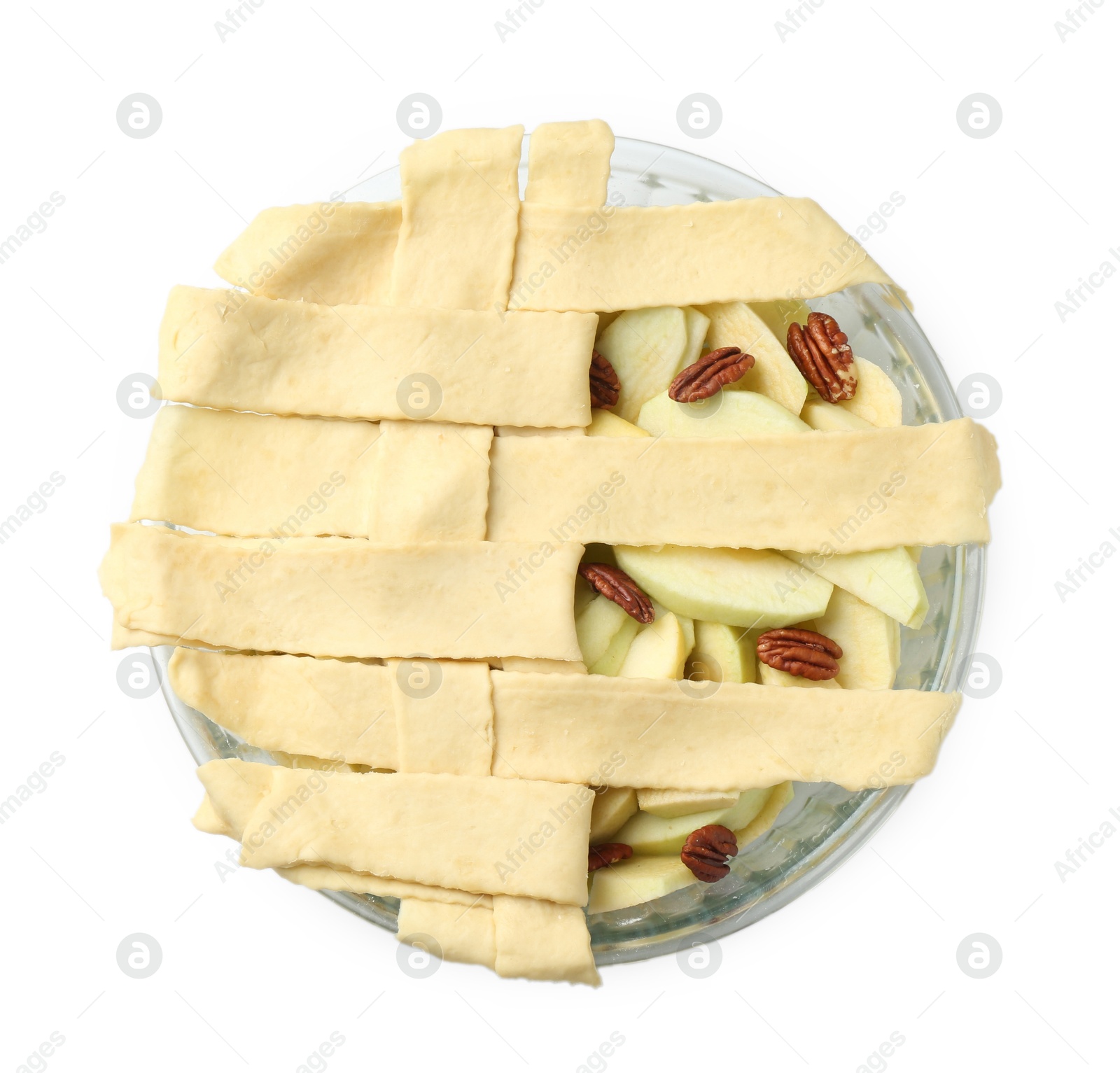 Photo of Raw homemade apple pie with walnuts isolated on white, top view