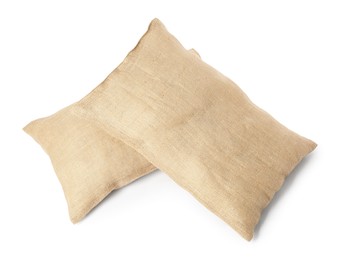 Photo of Two burlap sacks isolated on white, top view