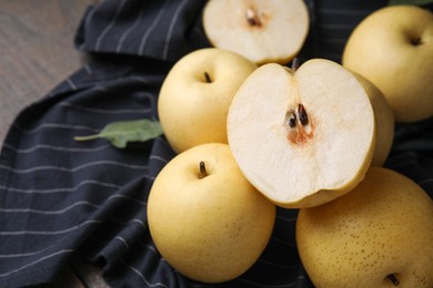 Photo of Delicious fresh apple pears on table, closeup