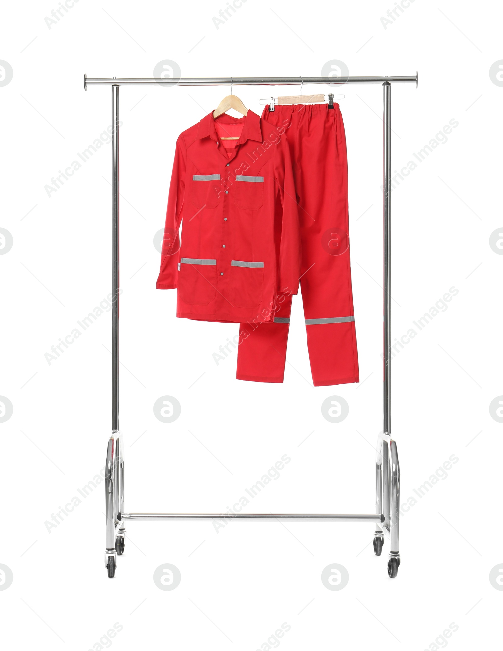 Photo of Paramedic uniform on clothing rack against white background