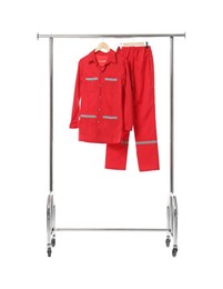 Photo of Paramedic uniform on clothing rack against white background