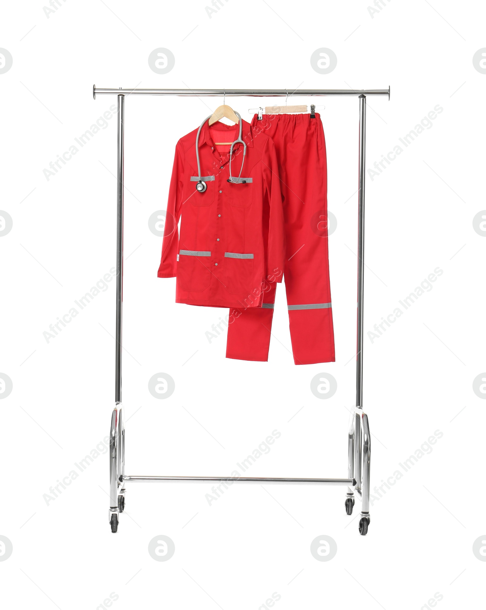 Photo of Paramedic uniform with stethoscope on clothing rack against white background