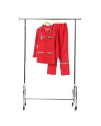 Photo of Paramedic uniform with stethoscope on clothing rack against white background