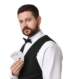 Professional croupier with playing cards on white background