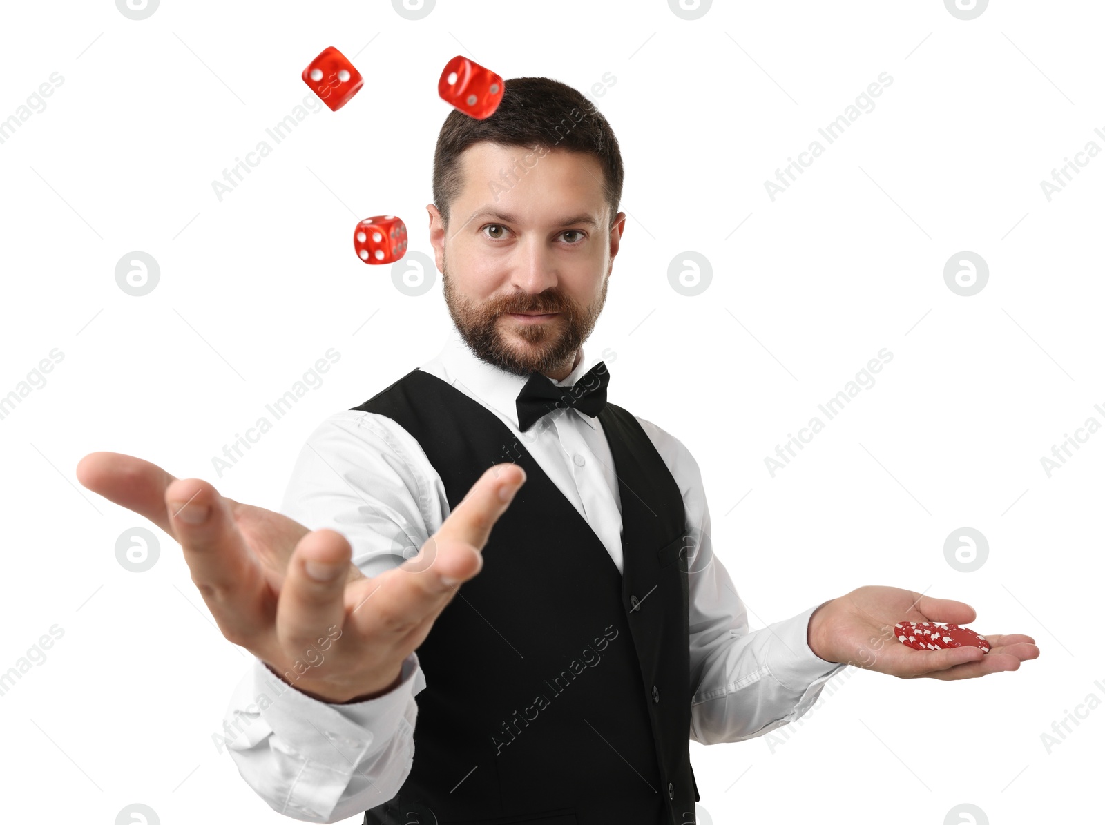 Photo of Professional croupier with dice and casino chips on white background