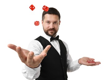 Professional croupier with dice and casino chips on white background