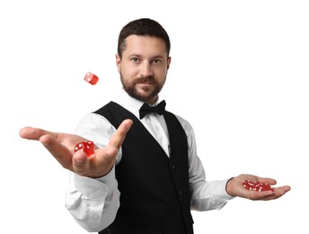 Photo of Professional croupier with dice and casino chips on white background