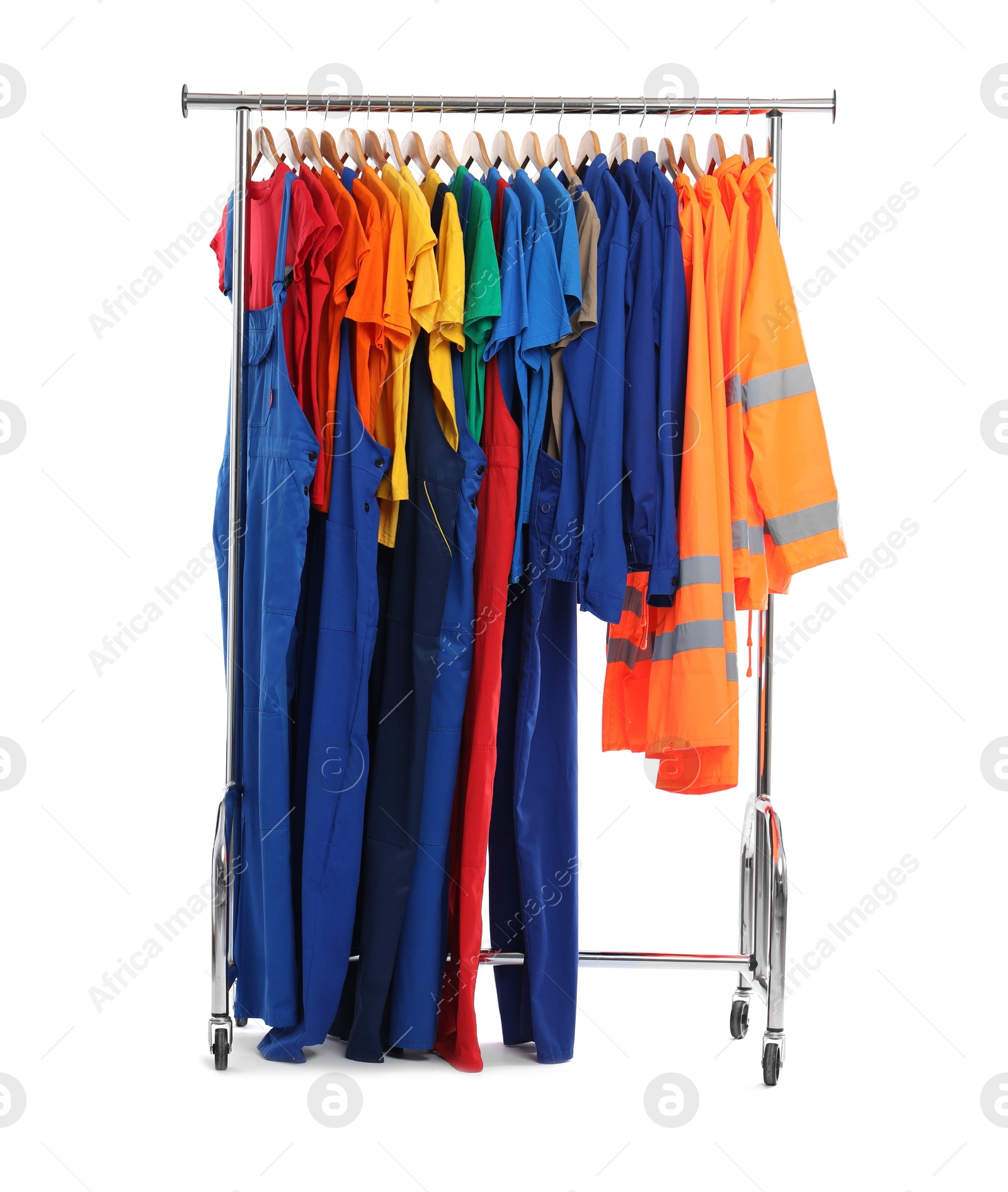 Photo of Different workers' uniforms on clothing rack isolated on white