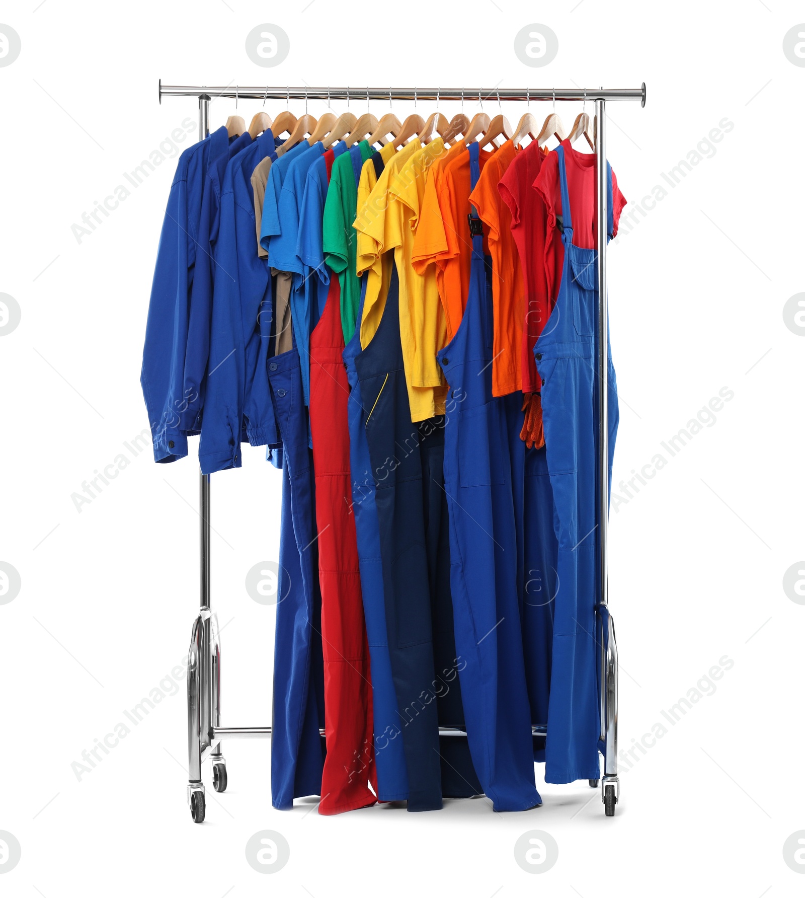 Photo of Different workers' uniforms on clothing rack isolated on white