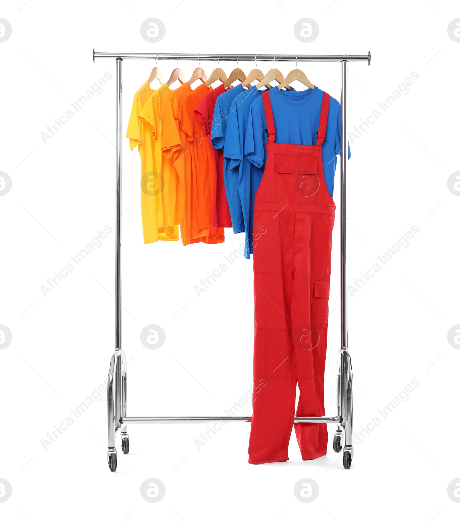 Photo of Worker's uniform and t-shirts on clothing rack isolated on white