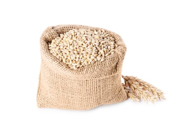 Photo of Burlap sack with dried wheat groats isolated on white