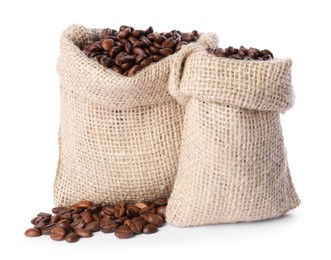 Photo of Burlap sacks with coffee beans isolated on white