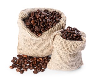 Photo of Burlap sacks with coffee beans isolated on white