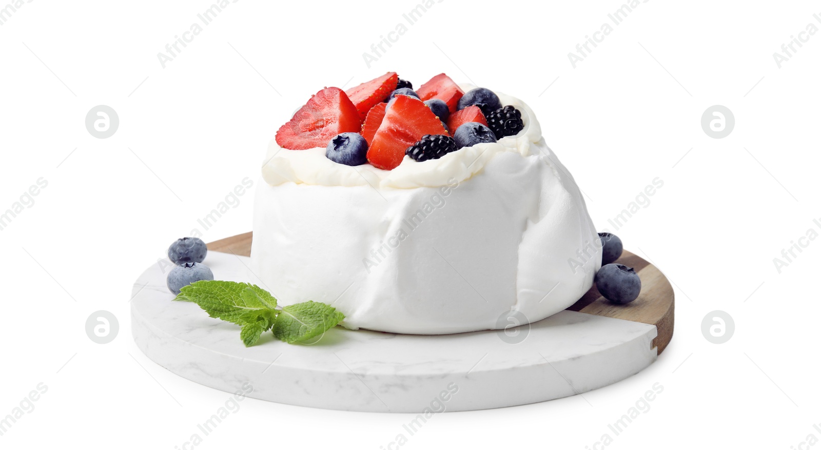 Photo of Pavlova cake (meringue dessert) with whipped cream, fresh berries and mint isolated on white