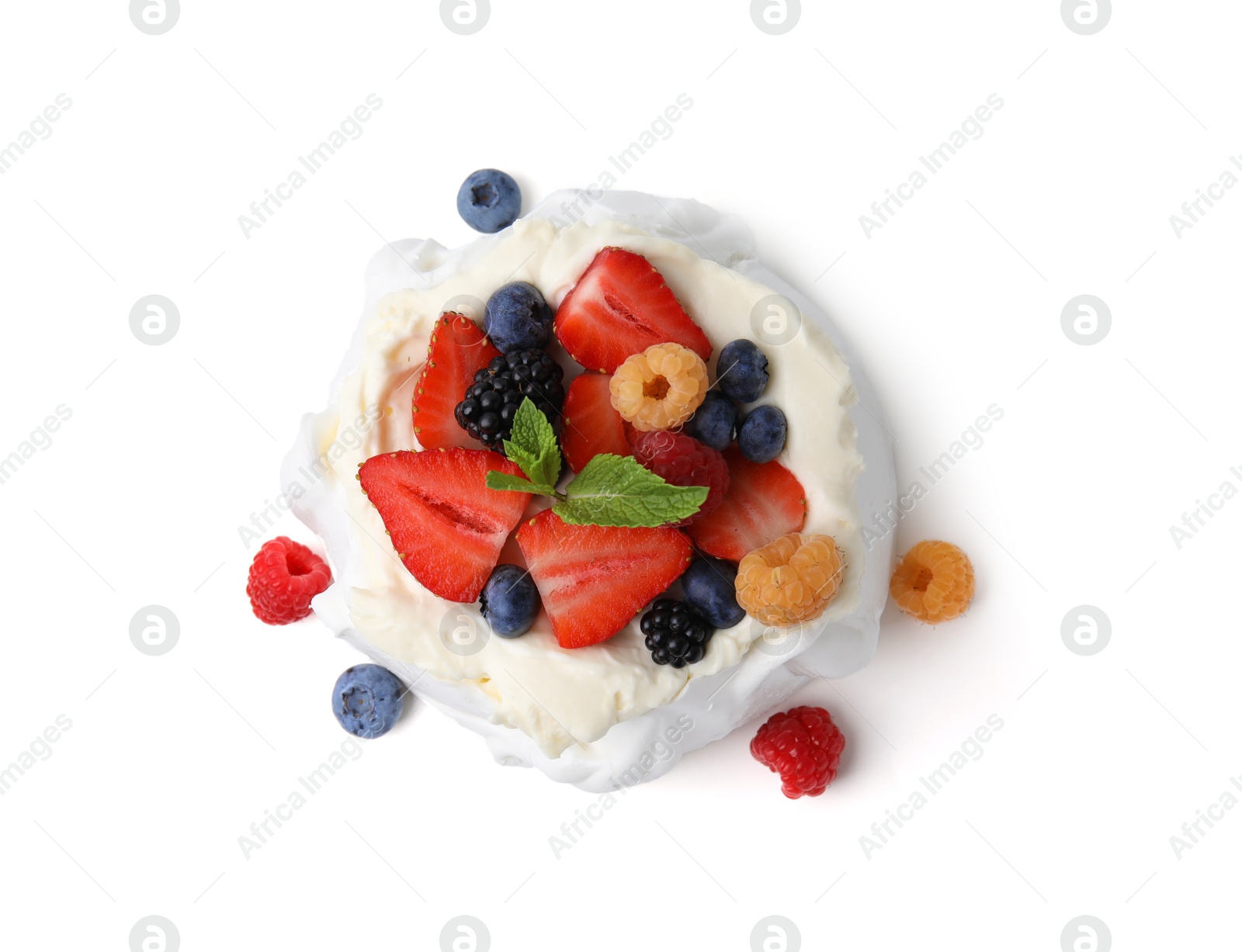 Photo of Pavlova cake (meringue dessert) with whipped cream, fresh berries and mint isolated on white, top view