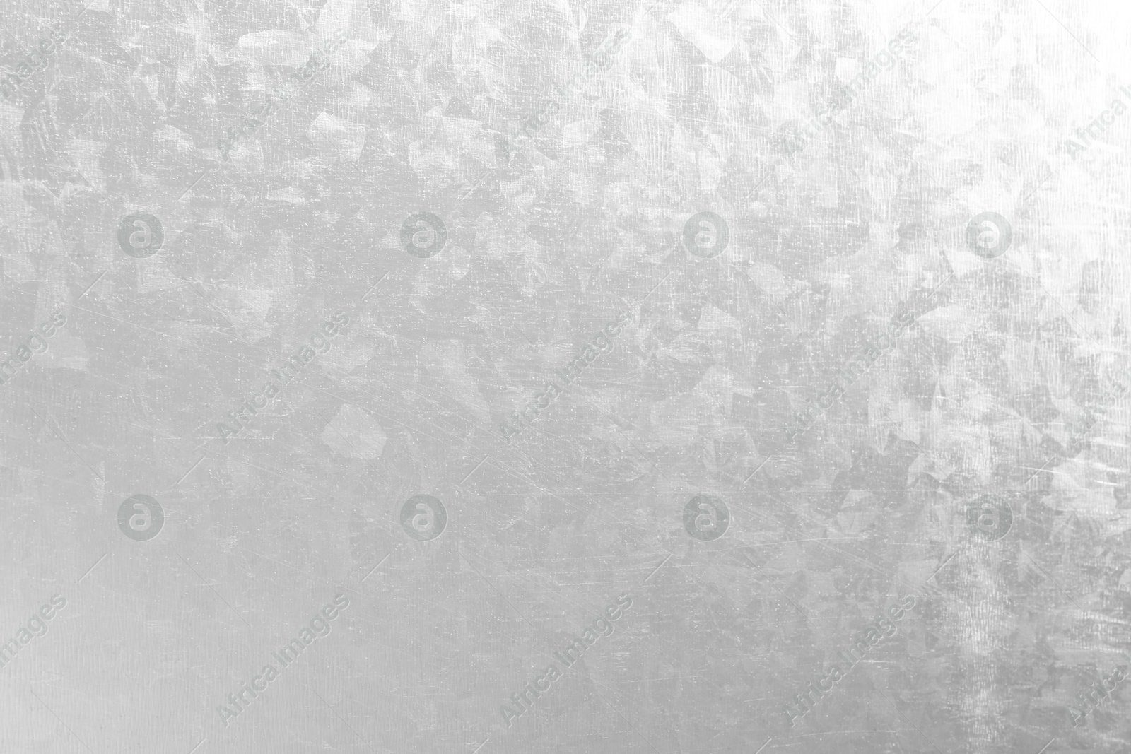 Photo of Shiny silver surface as background, top view