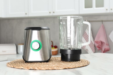 Photo of Blender kit on white marble table in kitchen