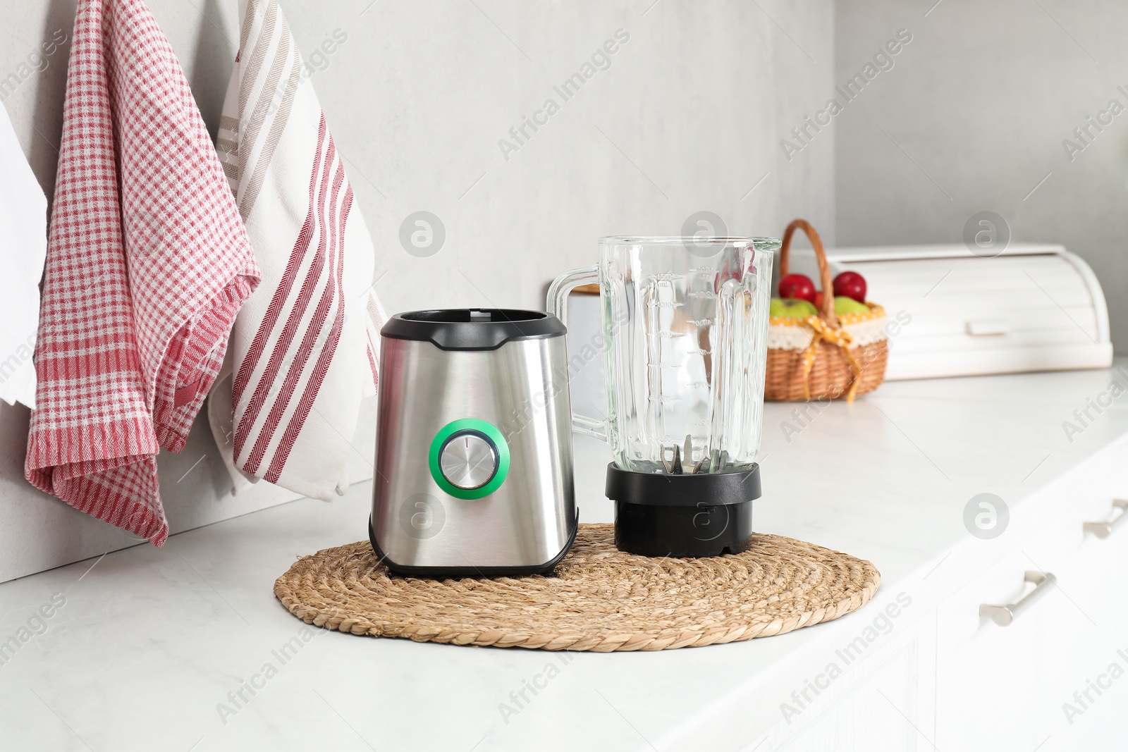 Photo of Blender kit on white marble countertop in kitchen