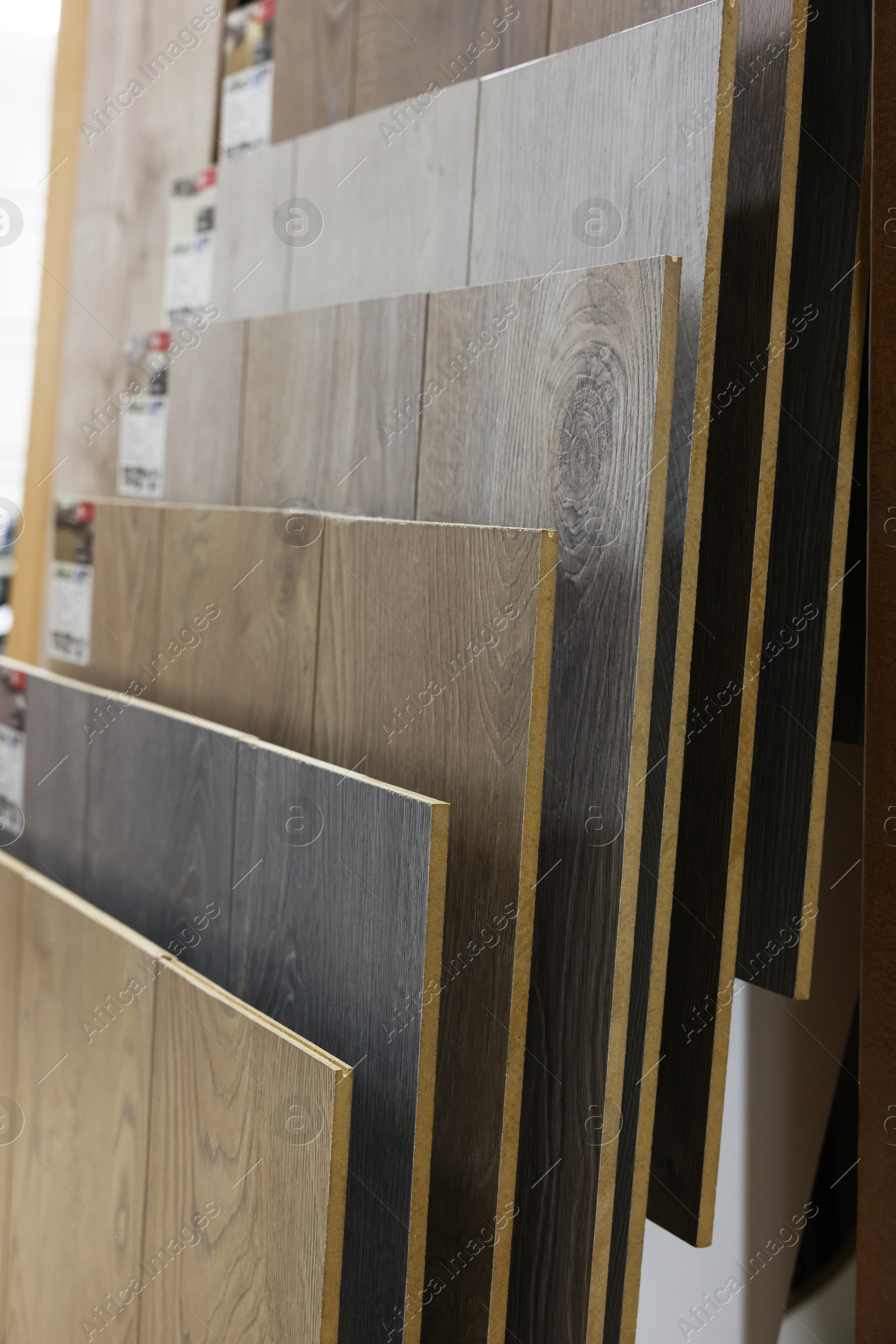 Photo of Many different samples of wooden flooring in store