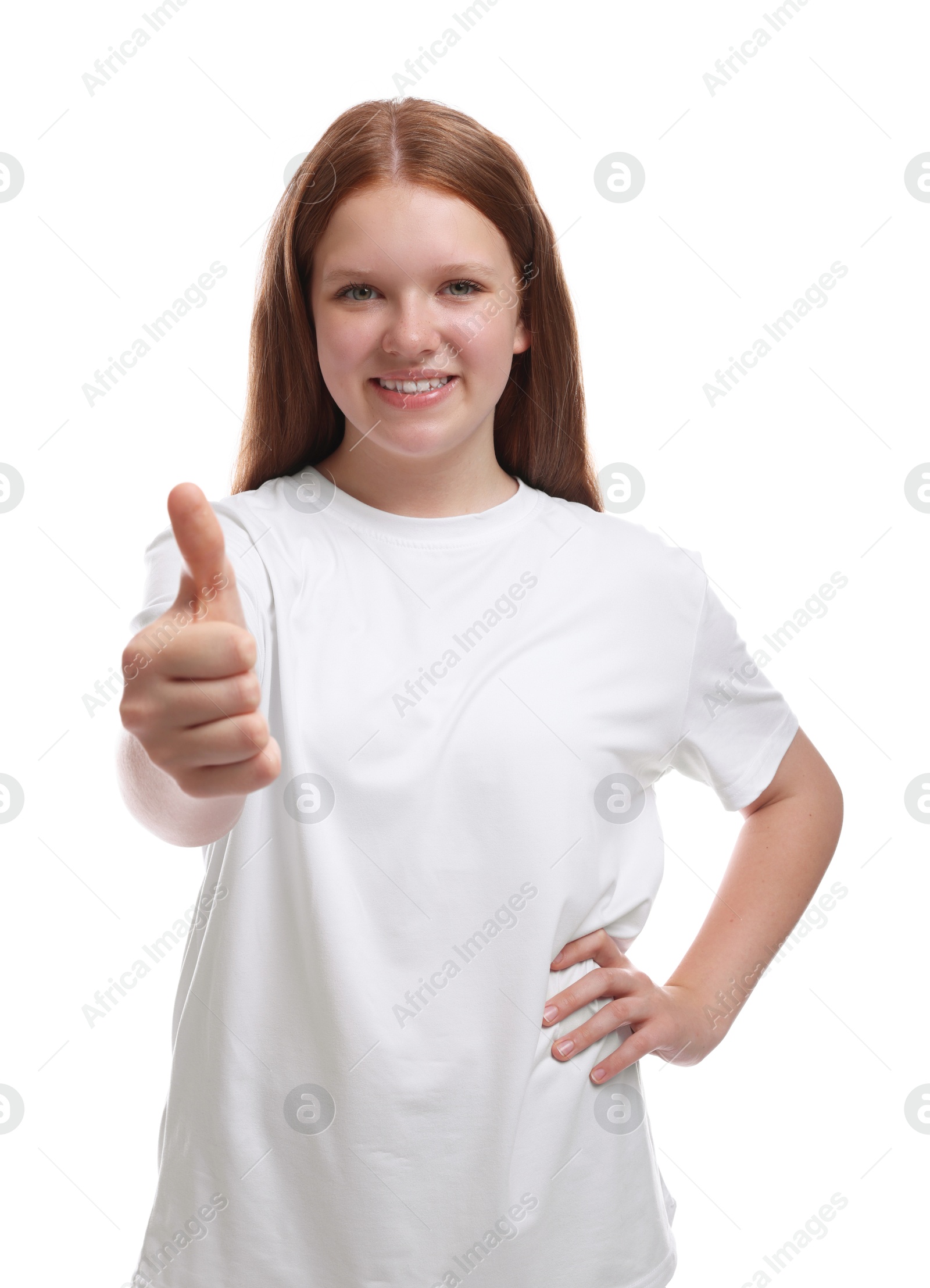 Photo of Teenage girl showing thumbs up on white background