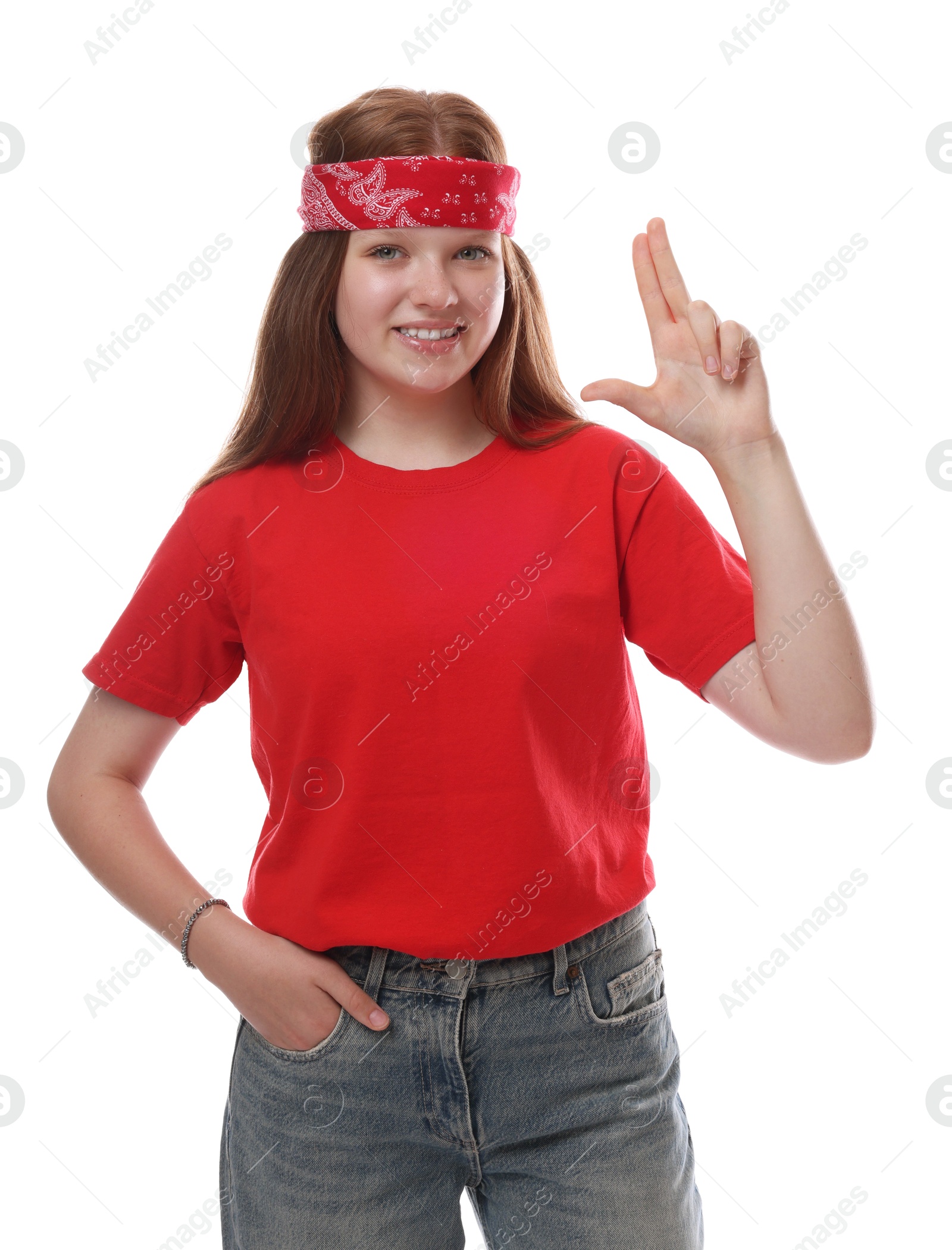 Photo of Teenage girl making finger gun gesture on white background