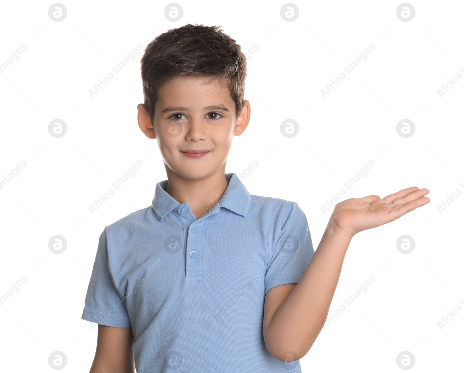 Photo of Portrait of cute little boy on white background