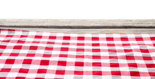 Photo of Tablecloth with checkered pattern on wooden table against white background