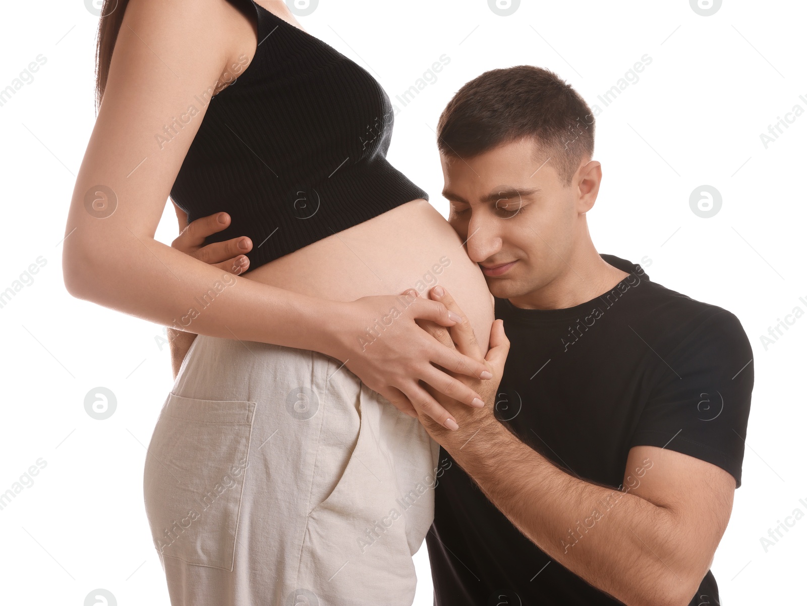 Photo of Man with her pregnant wife isolated on white