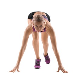 Photo of Runner in starting position on white background