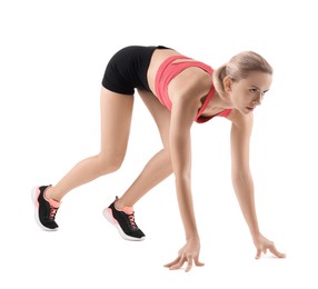 Photo of Runner in starting position on white background