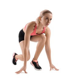 Photo of Runner in starting position on white background