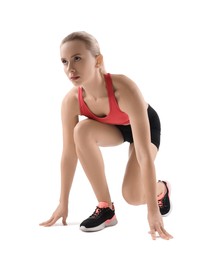 Photo of Runner in starting position on white background