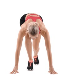 Photo of Runner in starting position on white background