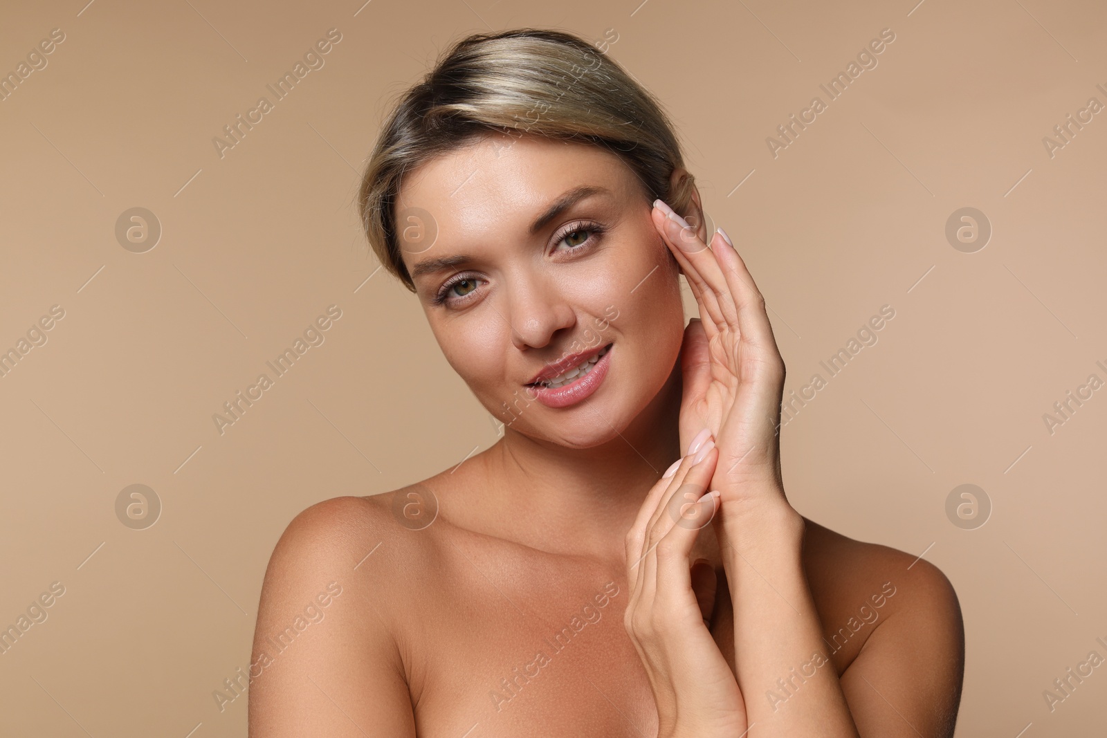 Photo of Cosmetology. Beautiful woman with perfect skin on beige background