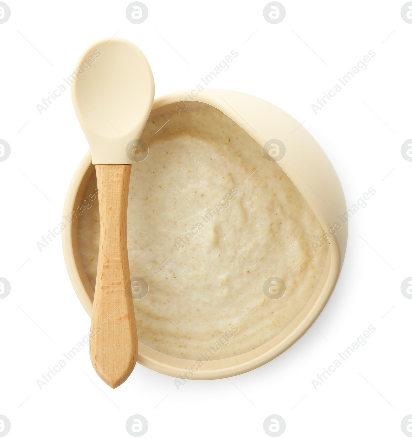 Photo of Delicious baby food in bowl and spoon isolated on white, top view