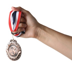 Photo of Woman with bronze medal on white background, closeup