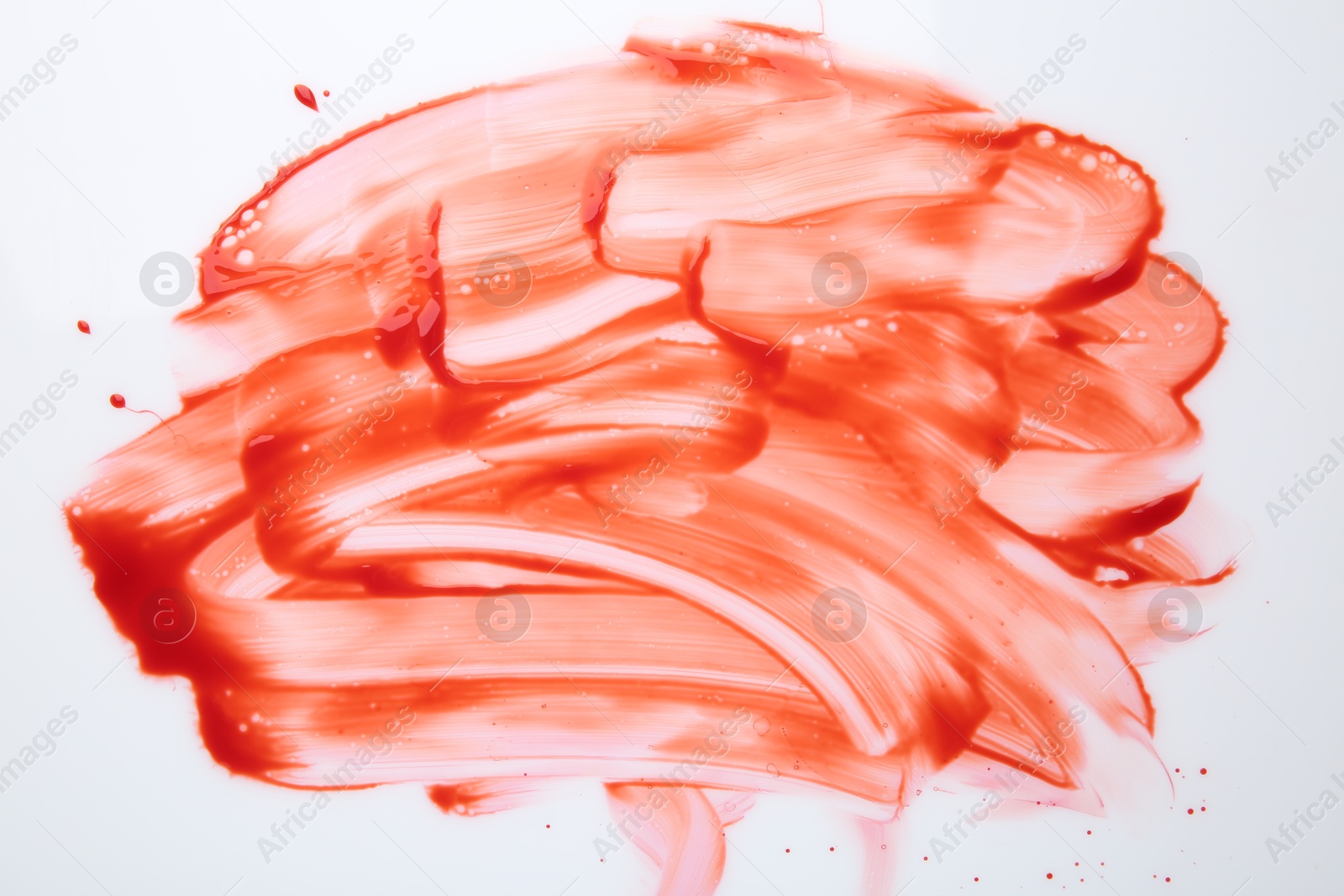 Photo of Stain of red blood on white background