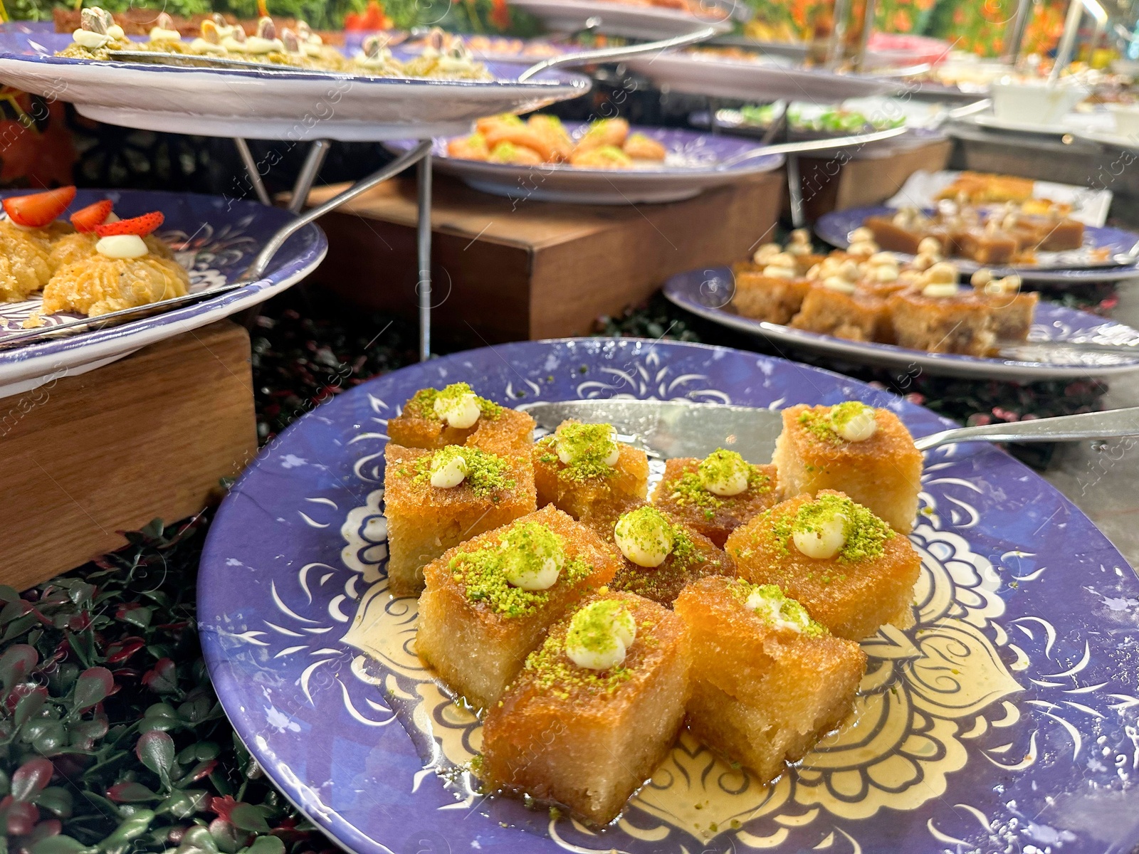 Photo of Different tasty desserts on table. Buffet service