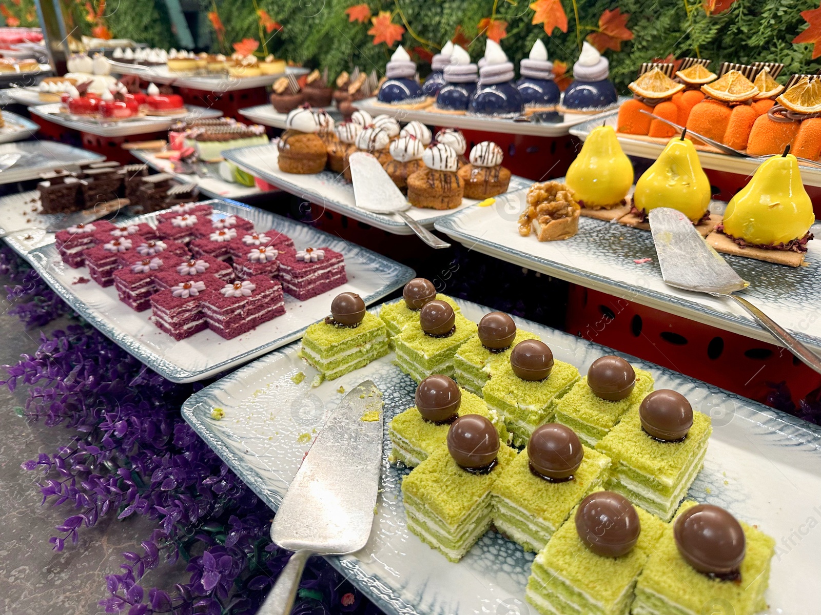 Photo of Different tasty desserts on table. Buffet service