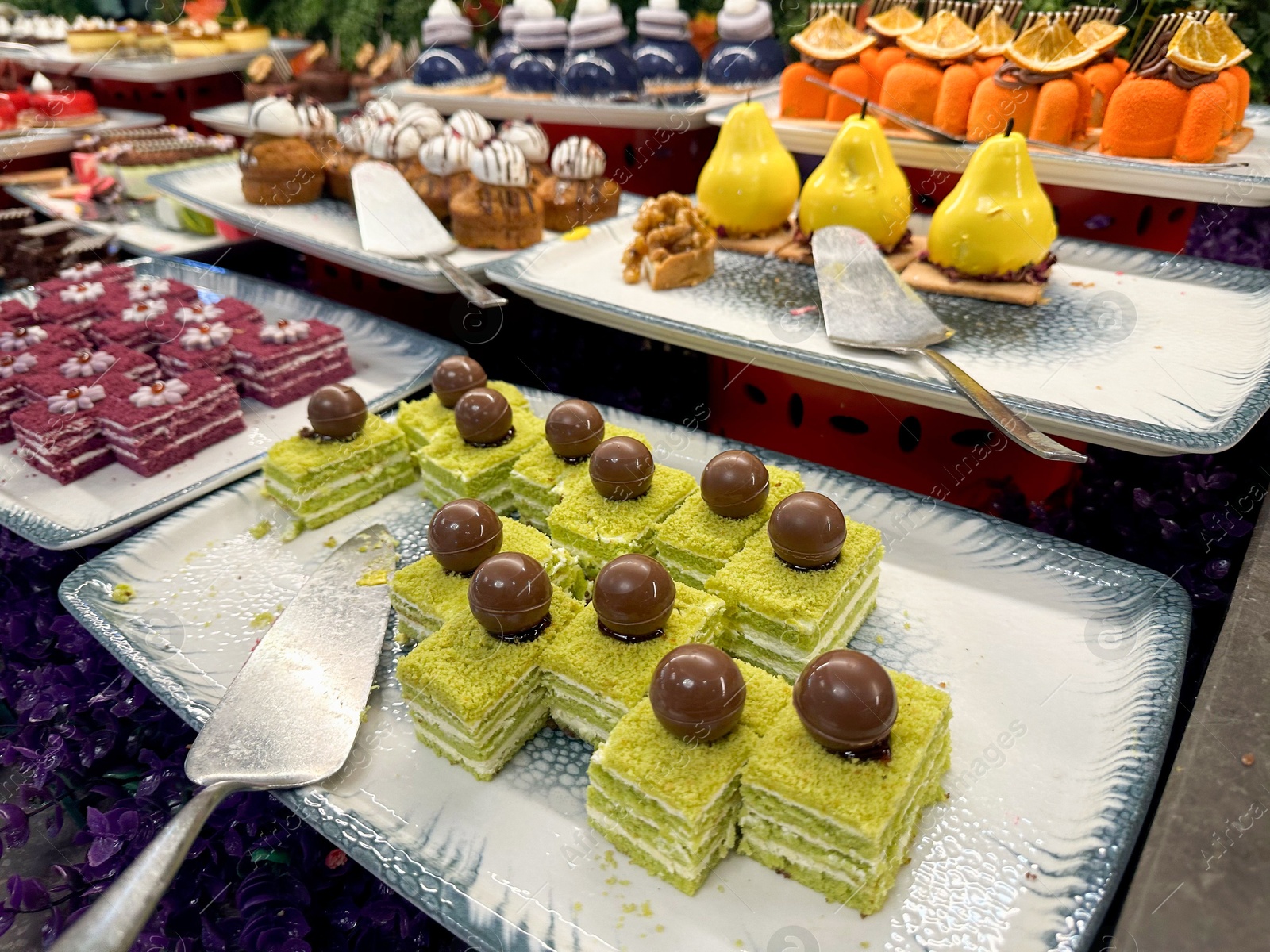 Photo of Different tasty desserts on table. Buffet service