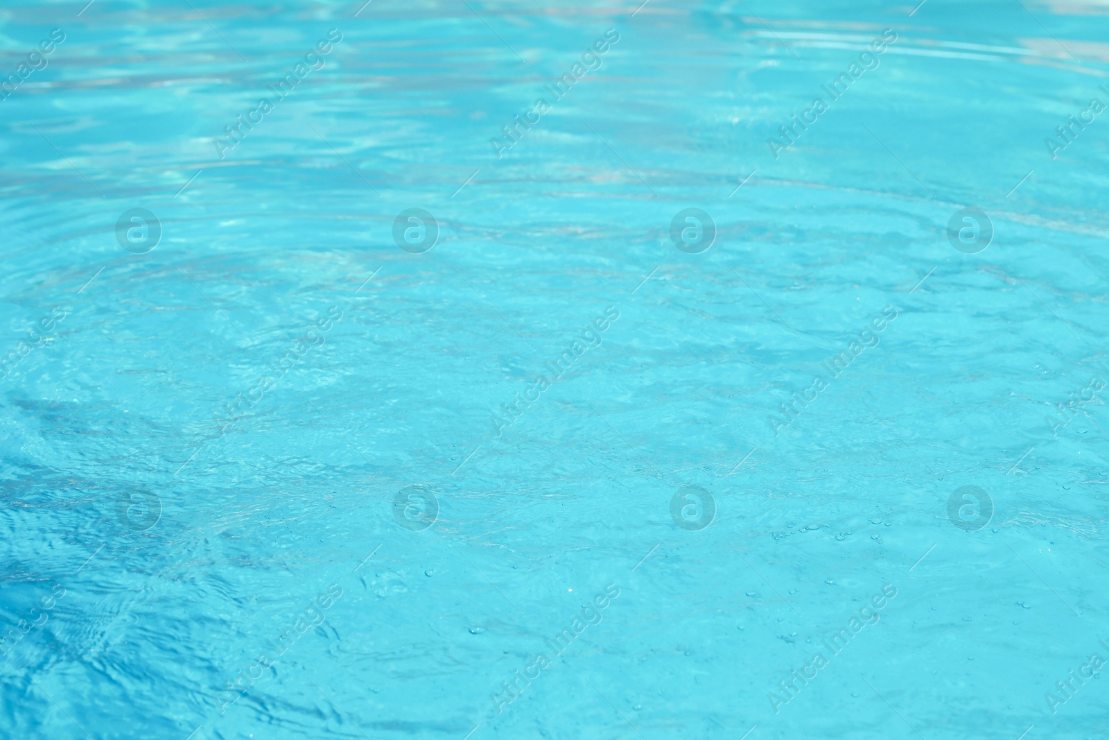 Photo of Clear water in outdoor swimming pool on sunny day