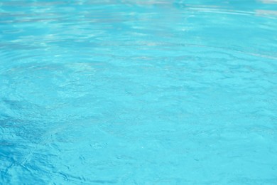 Clear water in outdoor swimming pool on sunny day